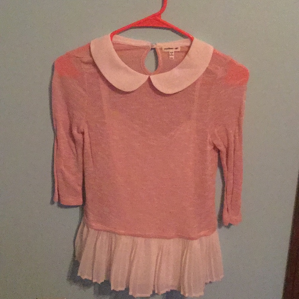 Light pink sweater with ruffles at the bottom